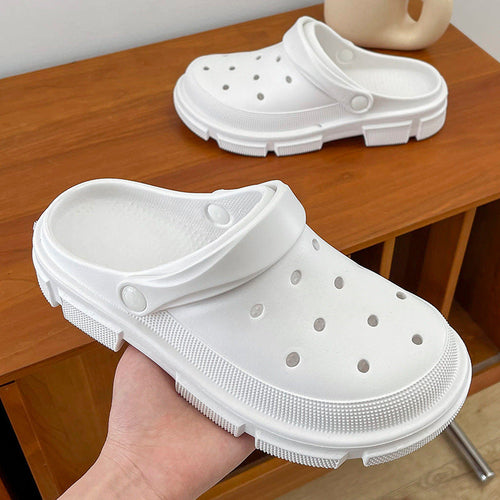Breathable EVA clogs with ventilation holes for indoor and outdoor use.