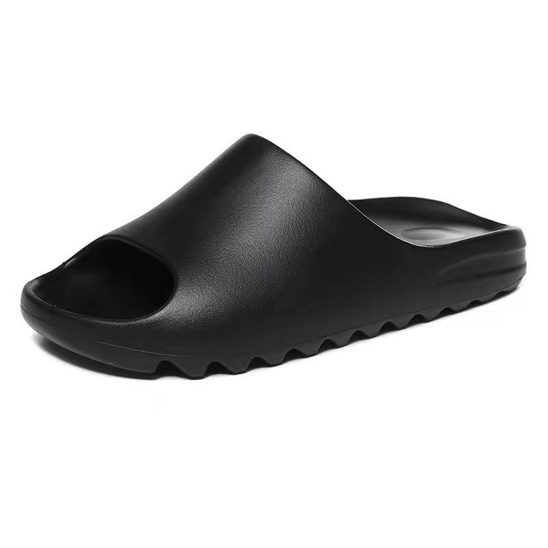 Black Cloud Soft EVA recovery slides with lightweight cushioned comfort.