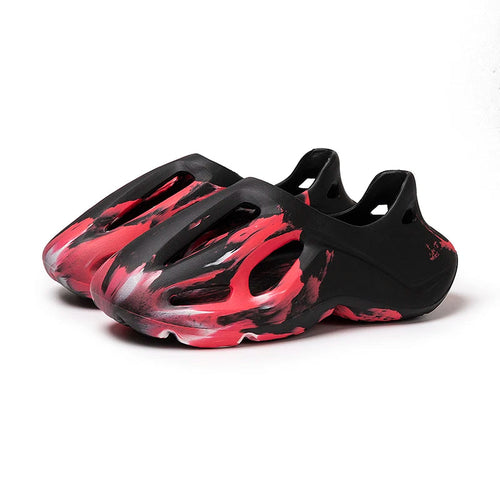 Comfortable camouflage clogs with lightweight EVA construction.