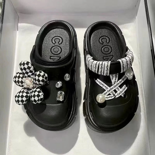 Stylish women's platform slides with modern minimalist design.