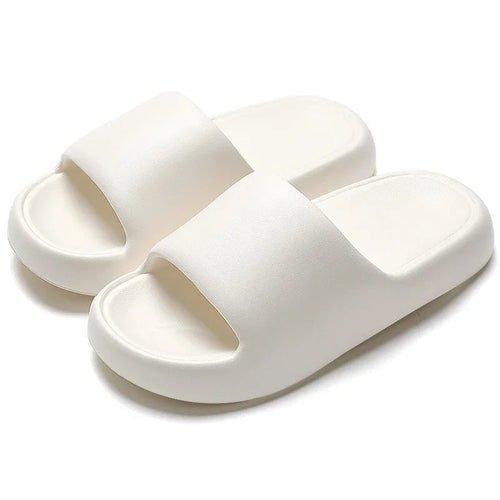 Premium EVA foam slippers with thick platform sole.