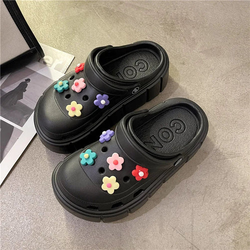 Women's comfortable slides featuring thick cushioned platform sole.